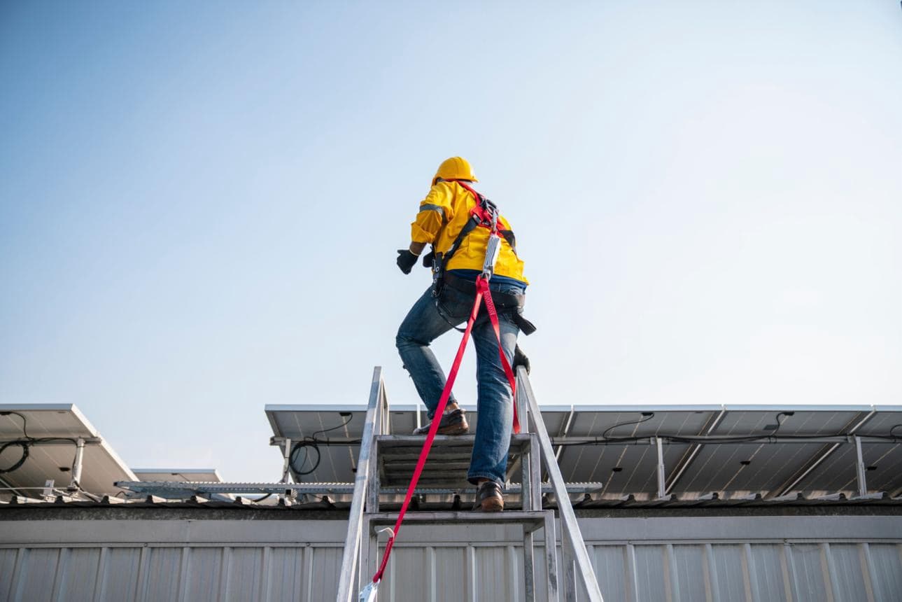 Solar team inspecting home energy equipment
